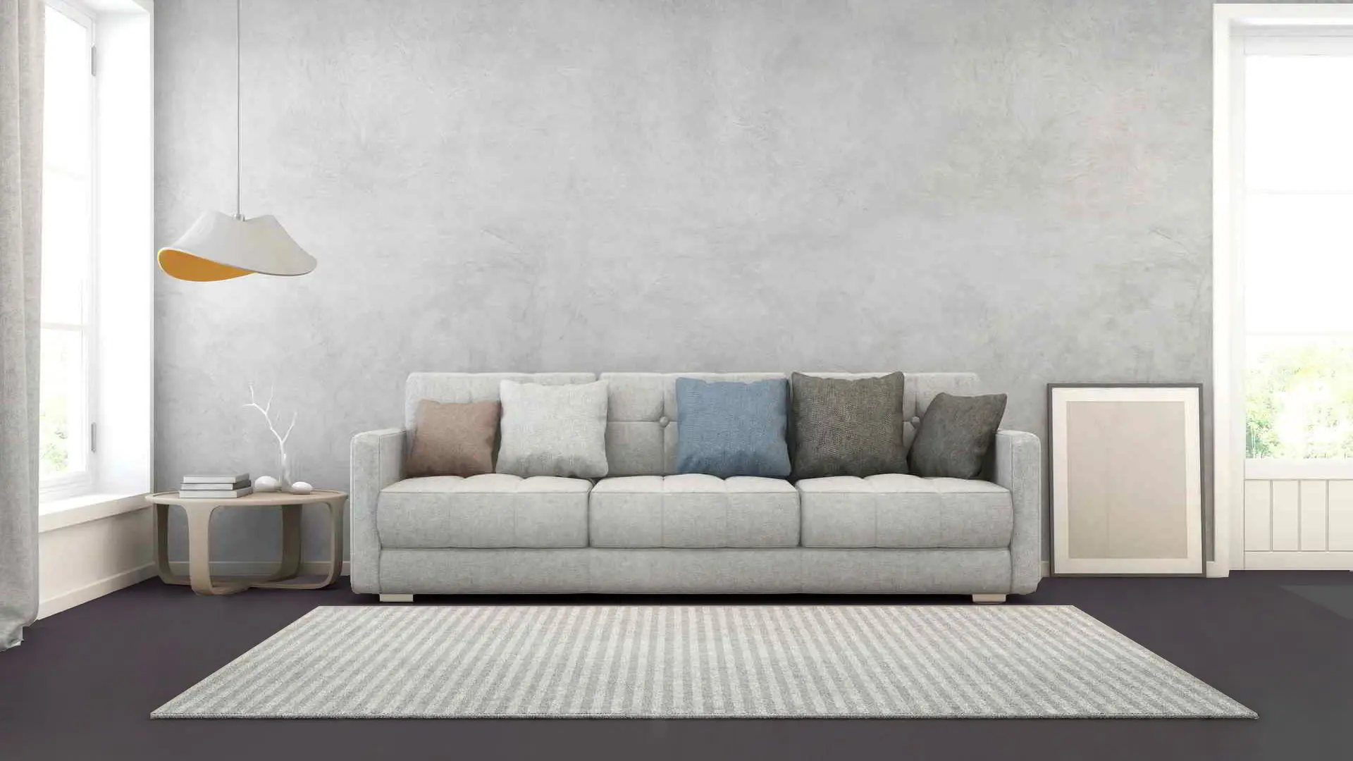 Moderní styl obývacího pokoje s mikrocementovou stěnou v šedém odstínu