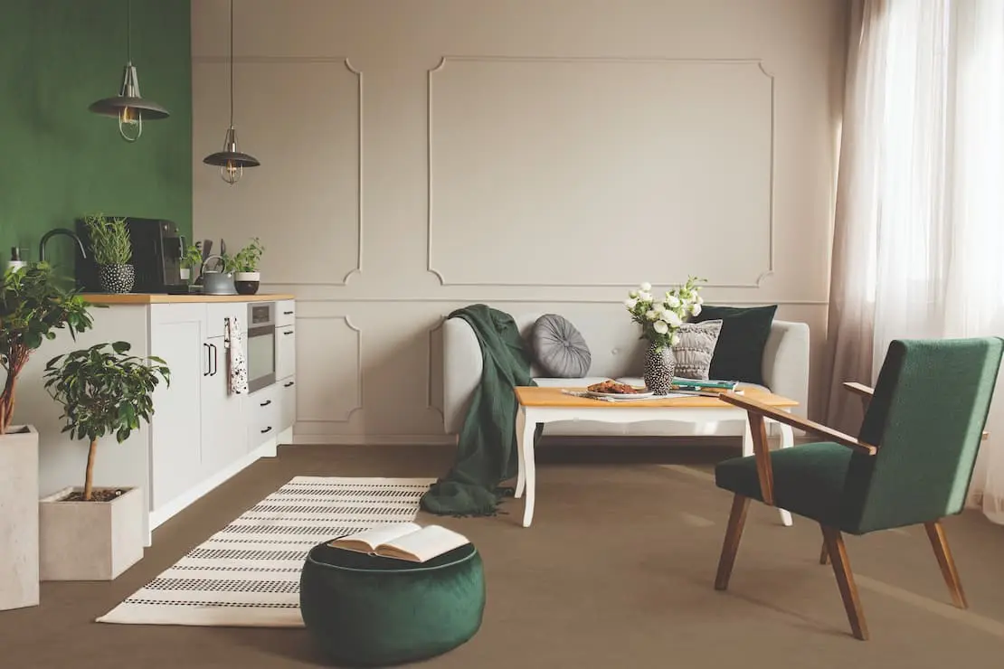 Loft with floor and wall covered with microcement over tiles