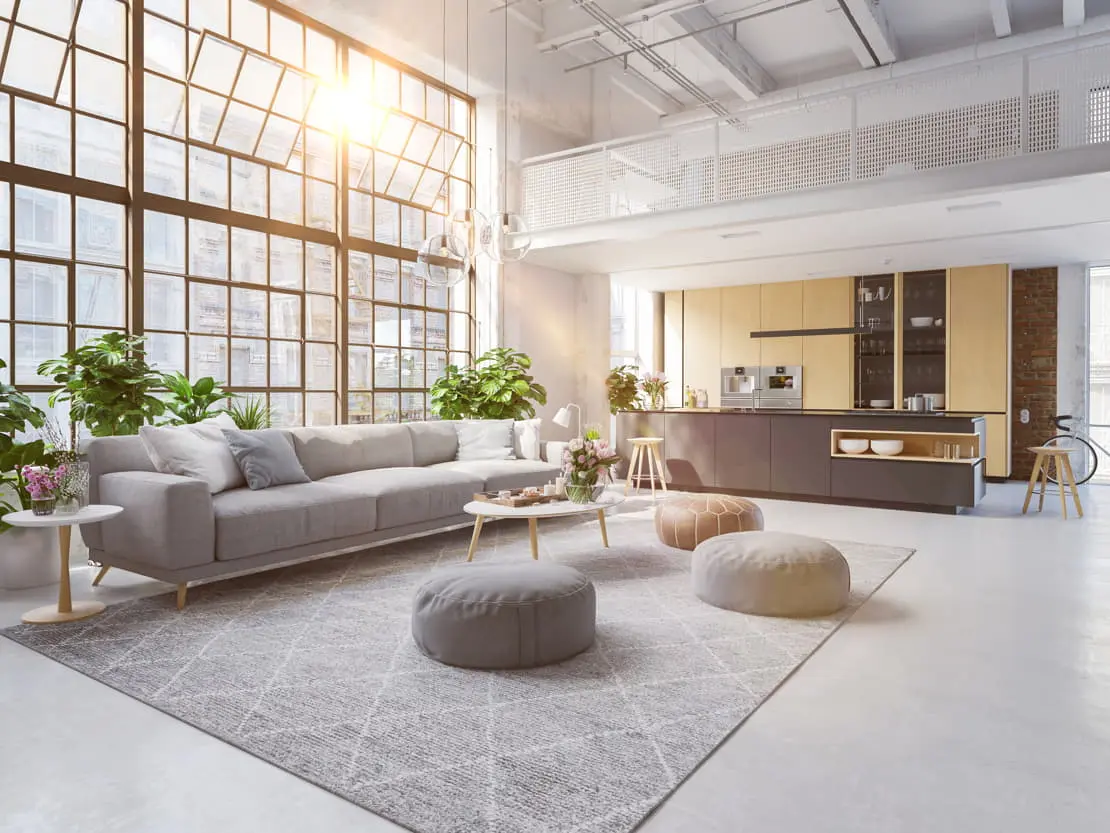 Microcement kitchen in an open space that connects with the living room