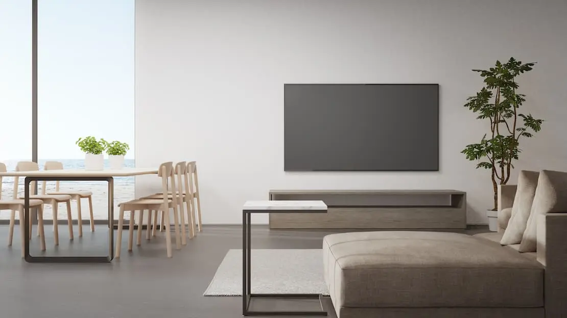Sienas un grīdas dzīvojamā istabā ar gludu mikrocementa tekstūru