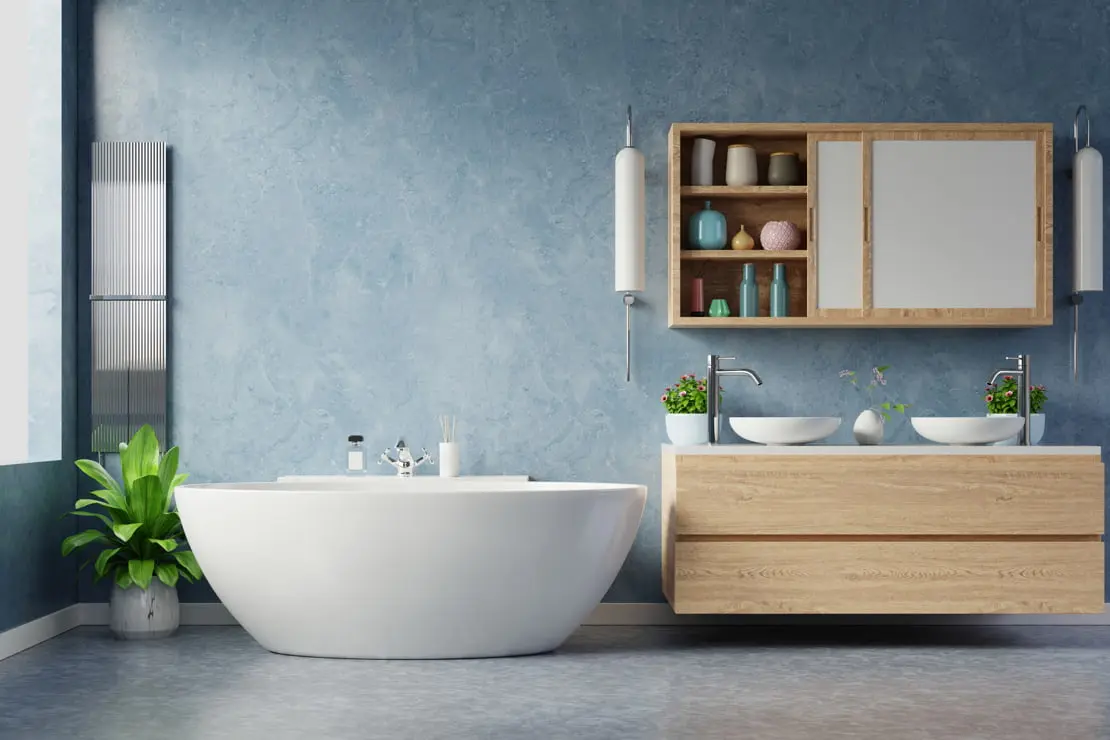 Microcement trên sàn và tường của một phòng tắm tối giản được trang trí với vòi nước màu đen